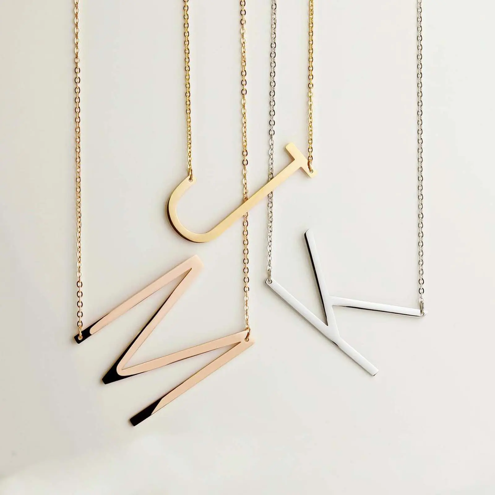 Stainless steel letter necklace for women 26 large English letter pendants golden hollow clavicle chain for men and women gifts