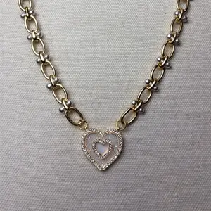 Monique Necklace with Heart Pendant and Pearl Accents in Matte Gold and Matte Silver