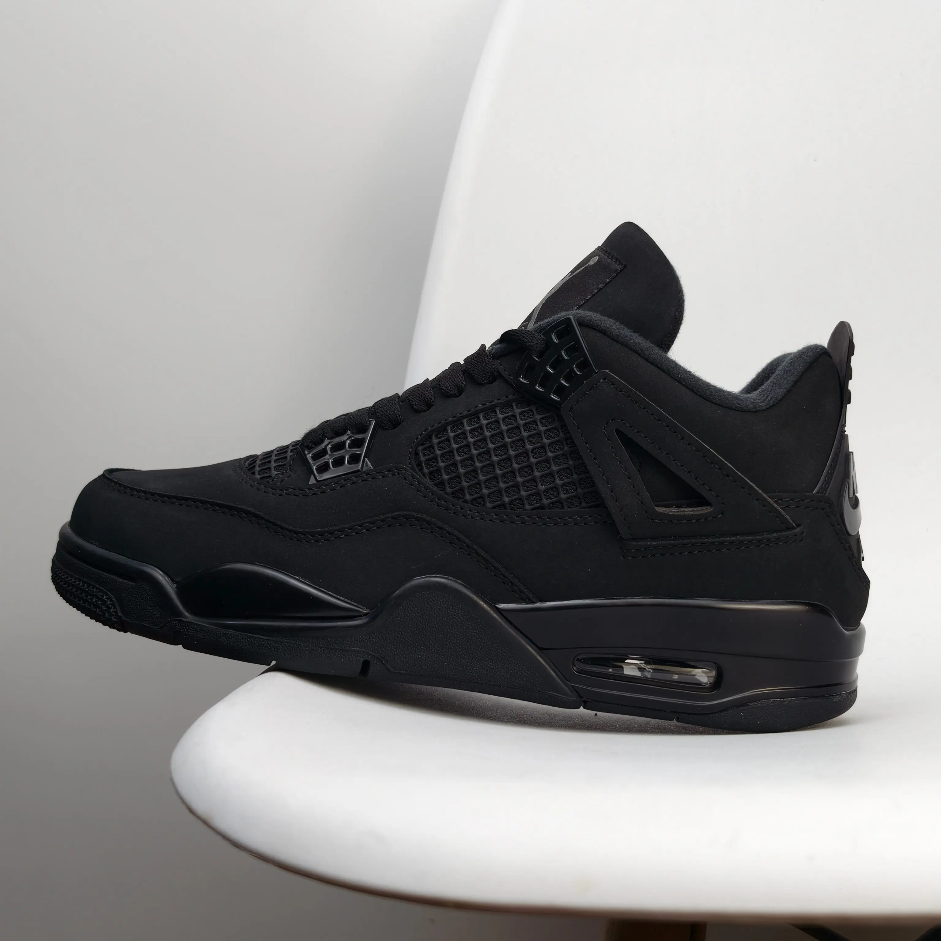 Unisex Mid‑Top Retro Basketball Sneakers,All‑Black Matte Nubuck Upper,Monochrome Black Mesh Panel,Full‑Black Midsole & Outsole,Visible Air Cushion,Lace‑Up Street Sport Shoes For Men Women Daily Wear