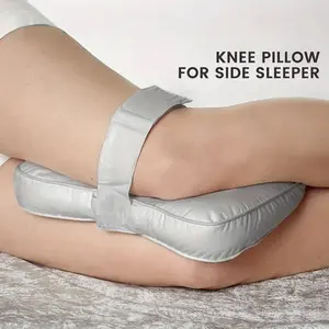 PrimPick Knee Pillow for Side and Back Sleepers - C-Shaped Leg Pillow. It features soft filling and is machine washable. This bed pillow is designed for spine alignment and reducing snoring, serving as a white adult bedroom accessory, sleep pillow