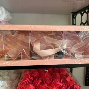 Elegant Pink Ribbon and Rose Petal Decorations for Special Occasions