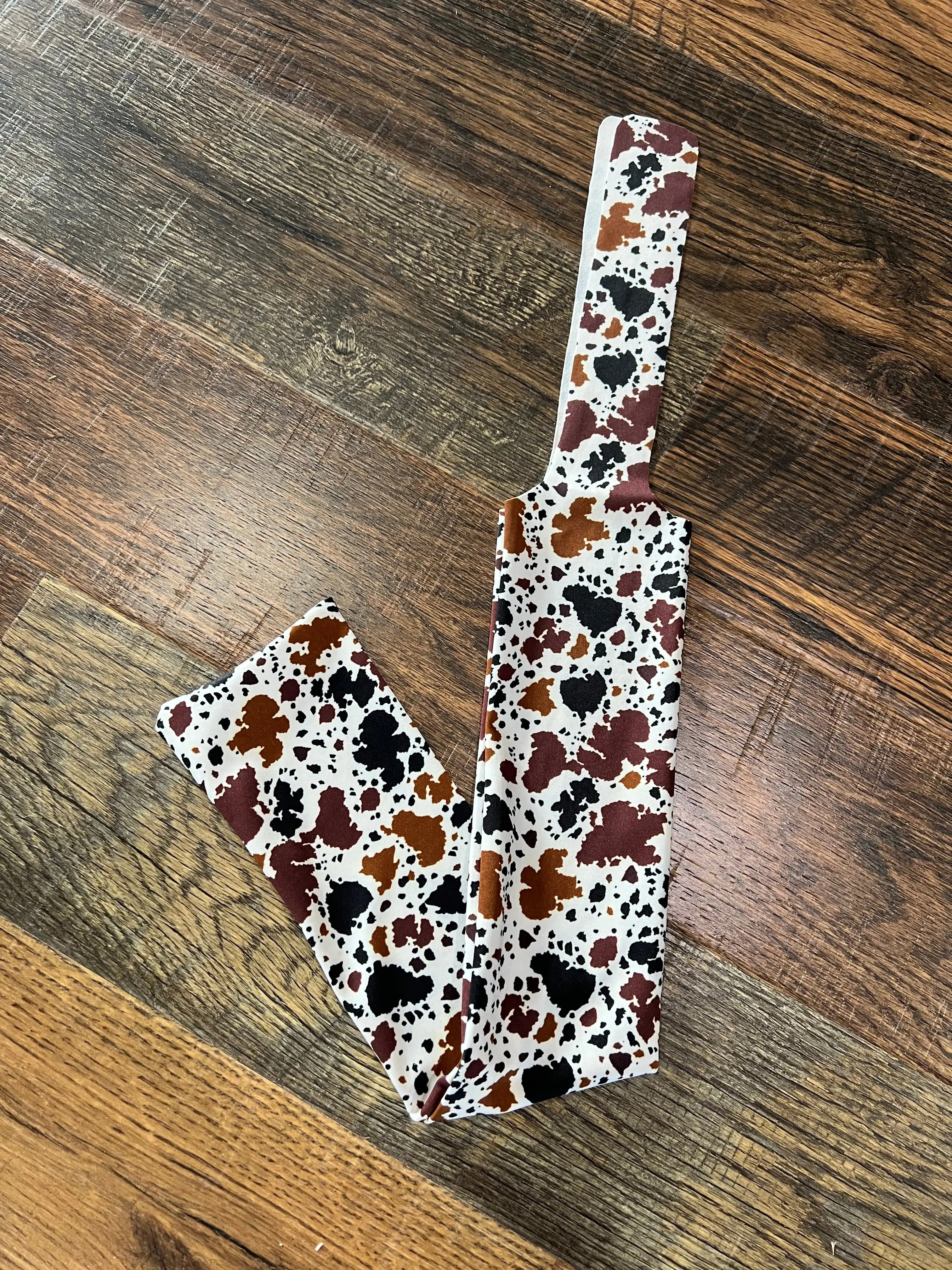 Cowprint Lycra printed slip on tail bag Cowprint Lycra printed slip on tail bag