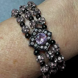 Pink and Black Flower Bracelet with Pink Center.