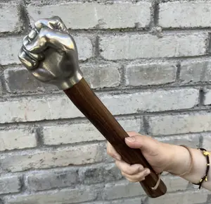 New creative multifunctional steel punching hammer with a solid wooden handle, high hardness, biomimetic hand shape design