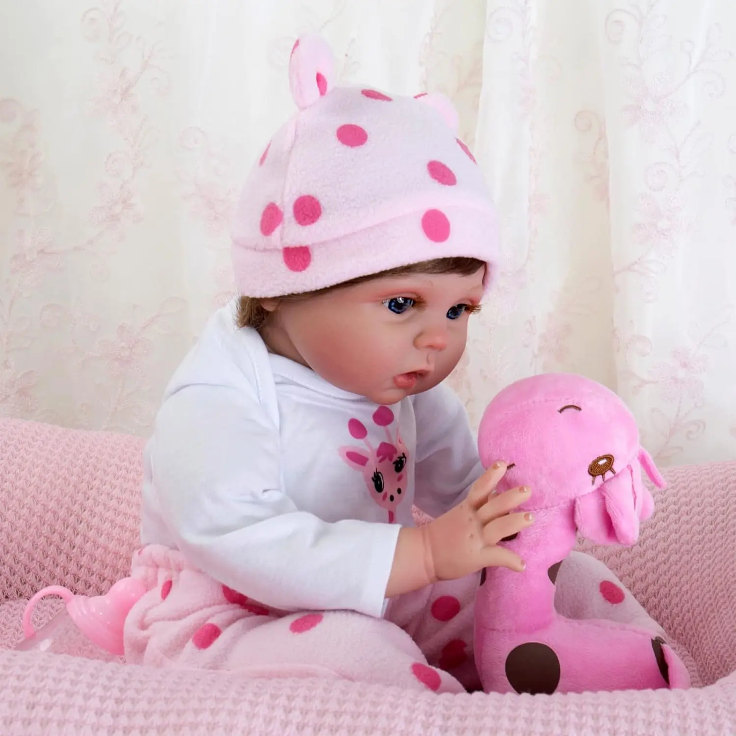 Rebirth Doll Girl, a 20 inch soft bodied newborn doll featuring pink giraffe clothing and plush giraffe toys, is a birthday gift for children's toy girls