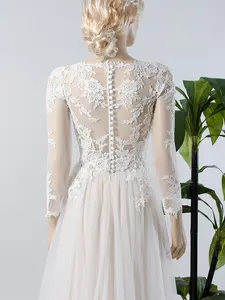 Long sleeve lace wedding dress with tulle skirt