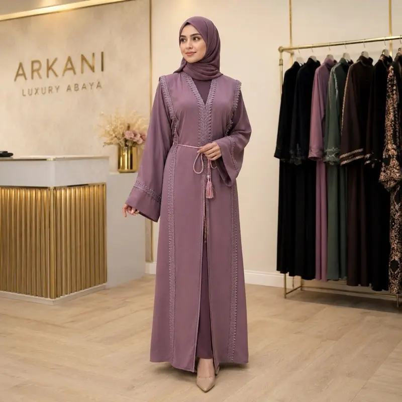 Abaya - Elegant Black Long Sleeve Dress with Tassel Detailing and Flowing Fabric for Special Occasions
