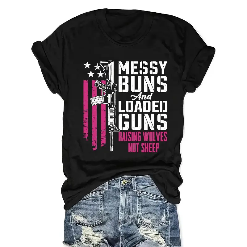 Women's Patriotic "Messy Buns & Loaded Guns" Graphic Tee - American Flag & Rifle Design, Raising Wolves Not Sheep Slogan, Black with Pink/White Lettering, Vintage Round Neck Shortsleeve, Geometric Casual Oversized Streetwear, Machine Washable