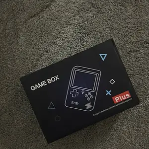 400 in 1 Hand Held Game Box - White Compact Design for On-The-Go Use User-Friendly with Intuitive Controls Versatile for Work and Leisure - Device