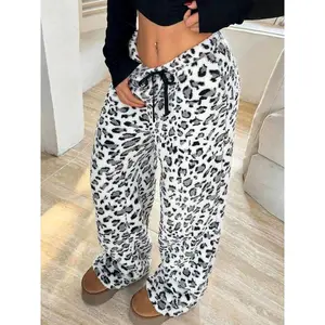 Women’s leopard-print suede pants with an elastic waistband—high-waisted, wide-leg trousers for autumn and winter, suitable for home wear and as comfortable, loose sleepwear. Fashionable loungewear for everyday at-home wear.