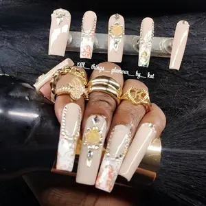 All Things Glamour by Kat Nude Cherub Foil Nails Set with Gold Accents and Elegant Designs