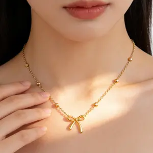 17KM 14K Gold Plated Bow Necklace for Women - Dainty Tiny Cute Bow Pendant Choker Chain - Adjustable Length with Lobster Clasp - Trendy Jewelry Gift