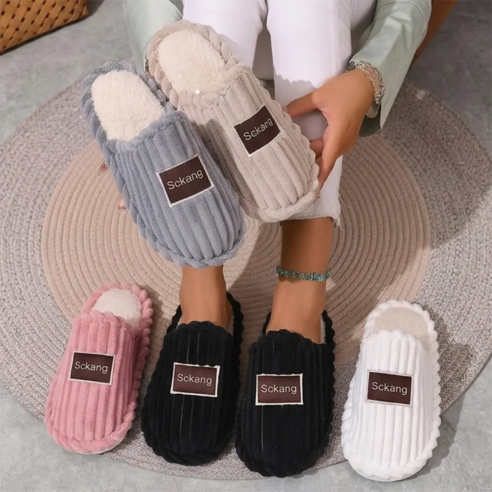 Lady's thick-soled warm and soft indoor-outdoor floor slippers made of plush fabric, suitable for postpartum recovery.