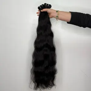 200 Gram. 26 Inch Natural Wavy Curtain Hair Long with Natural Texture and Dark Color