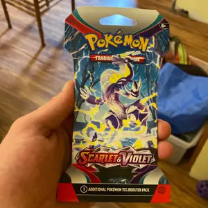 Pokémon scarlet and violet base set booster pack. Cardboard sealed