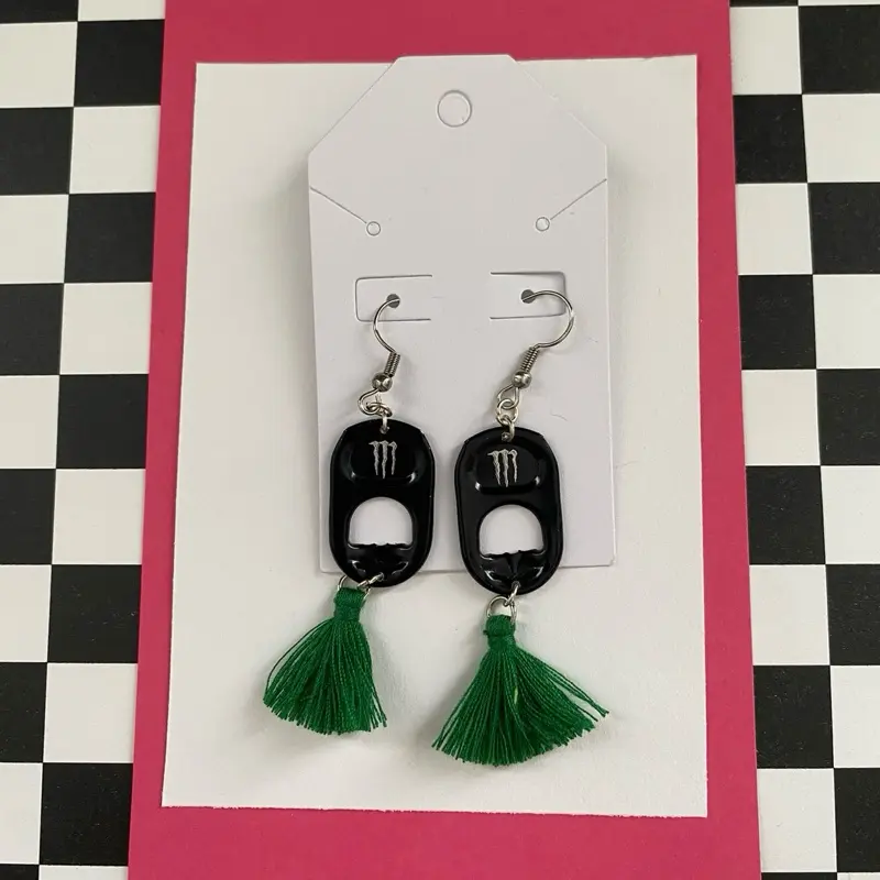 Black monster tab/green tassel Earrings