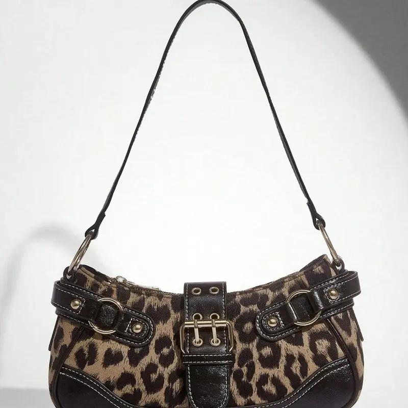 Retro classic punk style leopard print shoulder underarm bag, fashionable purse, personalized fashion metal buckle eye-catching design, niche fashionable and versatile suitable for daily travel, shopping, gatherings and parties, etc.