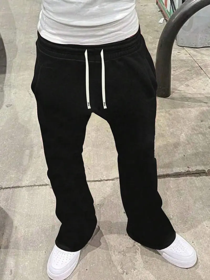 Men's loose-fit casual pants, soft and slightly stretchy, comfortable and breathable, with an adjustable waistband, suitable for year-round outdoor sports and fitness activities.