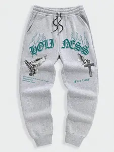 Unisex Baggy Graphic Sweatpants (Elastic Waist with Drawstring) - Cyber-Y2K Pigeon Style Joggers, Baggy Jogging Pants featuring "Free Flight" Quote, Heavyweight Tracksuit Pants for Autumn/Winter Streetwear Trends.