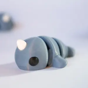 Articulated Baby Narwhal, 3D Printed Animal, designed by ZOU3D