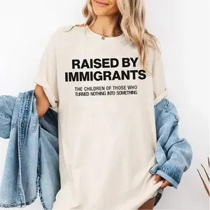 [100% Cotton] Raised By Immigrants merch T Shirt Statement Graphic Print, Bold Quote Empowerment Cotton Tshirt Unisex Crew Neck, Streetwear Casual Outfit For Men Or Women, Social Justice Gift, Meaningful Gift