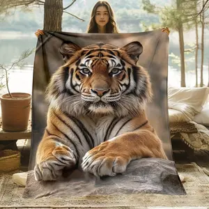 Single Piece of a Tiger-Themed Blanket Designed for Comfort, Perfect for Use on Sofas, During Outdoor Activities, Camping, in Living Rooms, Offices, on Chairs, And Beds. This Soft And Cozy Flannel Throw Features Digital Printing