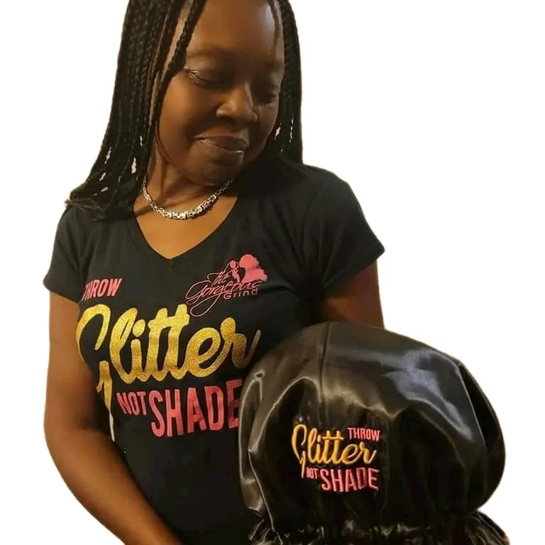 Handmade satin on satin reversible bonnets. Customized with machine embroidery. Black on pink.