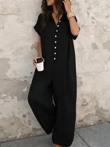 A lady's fashion French lazy-fit Casual jumpsuit with a loose button-up design, featuring slimming wide-leg style. Perfect for summer, suitable for light social occasions, afternoon tea, vacation trips, commuting, and at-home wear.