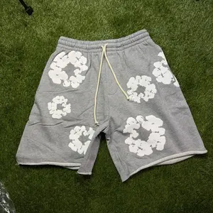 DENIM TEARS GREY SHORTS
