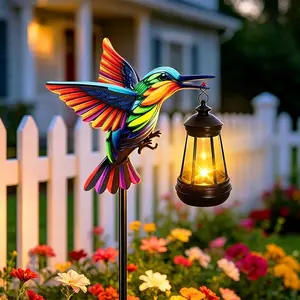 Solar-powered garden lights, waterproof for outdoor use, including stake lights with solar lanterns, hanging solar lights, and solar path lights, suitable for decorating yards, outdoor patios, and gardens