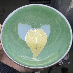Handmade green tea cup, golden wooden leaf master tea cup, and cup construction