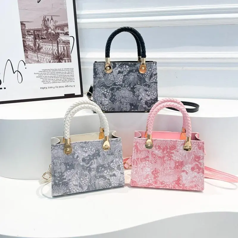 Textured light luxury portable small square bag women's bag spring and summer new woven flower versatile shoulder bag commuter messenger bag