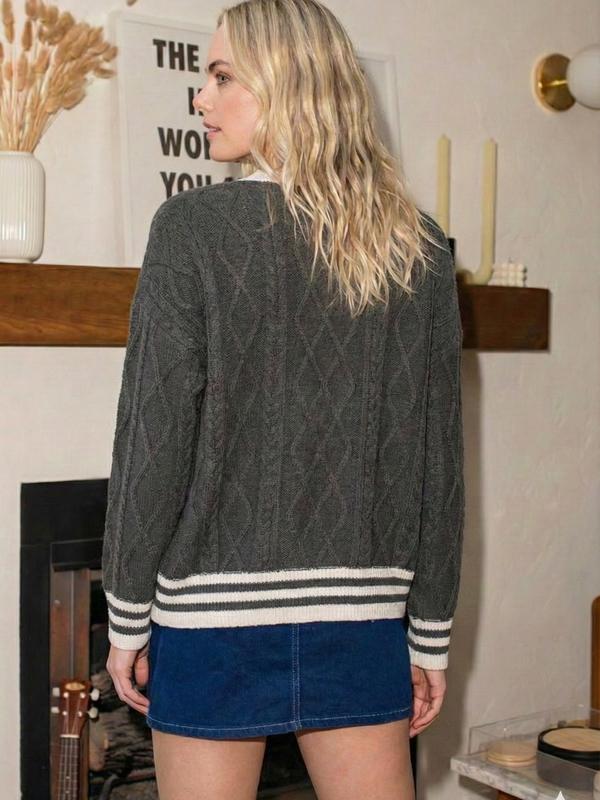 Preppy Cable Knit Varsity Cardigan  Textured cable knit cardigan with contrast varsity-inspired trim.