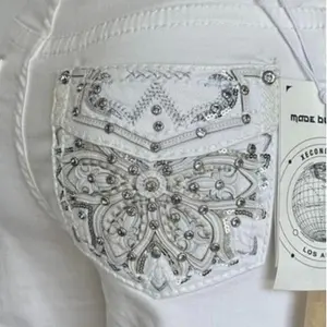 White Xecondo Yves Mom Jeans with Embroidering on Back pocket risen jean Cotton Womenswear