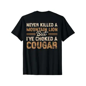 Humorous Never Killed Mountain Lion But Choked Cougar Graphic Tee with Orange Text Lightweight Short Sleeve Casual T Shirt for Men and Women All Season Comfort Durable Digital Print for Outdoor and Casual Wear