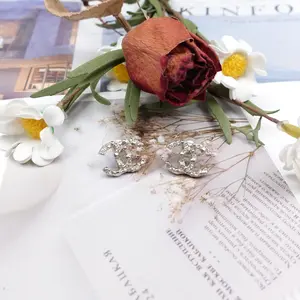 Pre-owned Chanel Gold Tone Diamond CC Silver Earrings T10319997