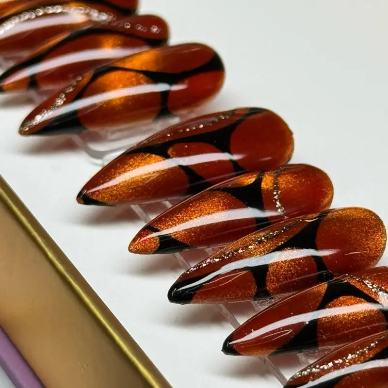 Holiday Fire - LENGTH: MEDIUM/ SHAPE: STILETTO - set of 20 REUSABLE press-on gel nails with vibrant orange and black design