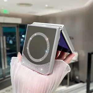 Rhinestone Magnetic Mirror Phone Case is compatible with Samsung Galaxy Z Flip 6, Z Flip 5, Z Flip 4 and Z Flip 3. This shockproof protective case features durable protection and a secure grip design, perfectly suited for daily use.