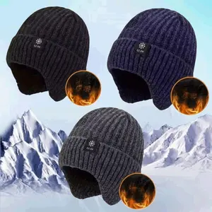 Men's stylish winter knitted fur cap with heated ear pads, suitable for outdoor activities such as fishing, skiing, and hiking, providing warmth and protection from the cold. Fishing cap with heated ear pads.