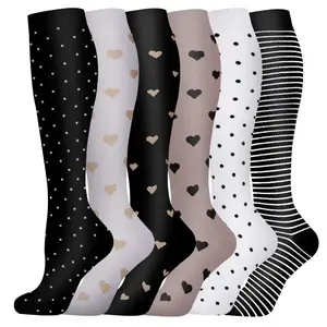 6 pairs of compression calf socks - fast drying, long-lasting support for running, fitness, and recovery. Compression knee socks with flower patterns for good moisture absorption and sweat wickingRAIMENTRY
