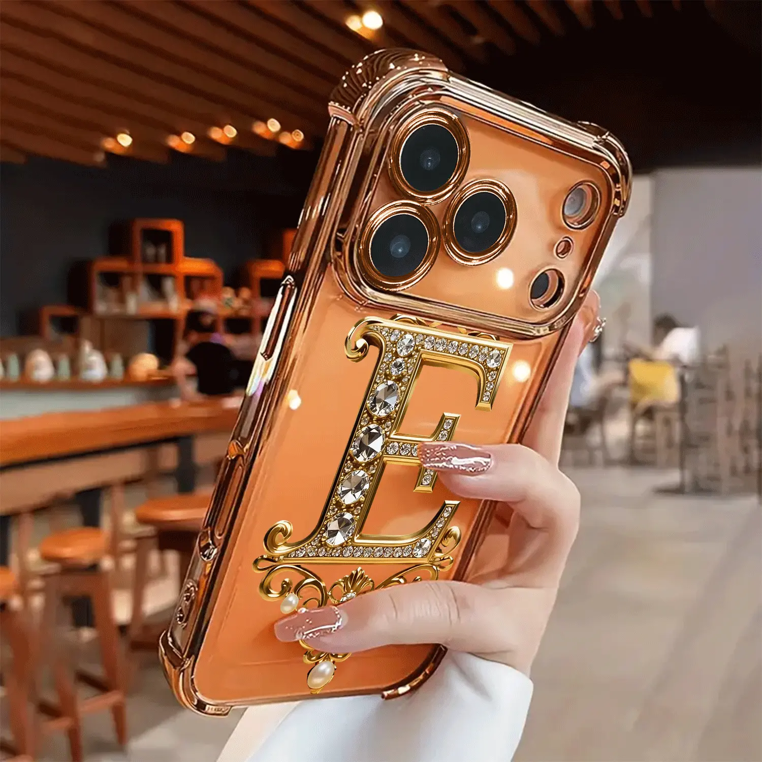 Creative diamond and gold "E" pattern, drop-proof and non-slip TPU full-coverage lens-plated phone case, compatible with iPhone 17, 16, 15, 14, 13, 12, 11, XS, X series and other models. Makes a great gift for friends or family.
