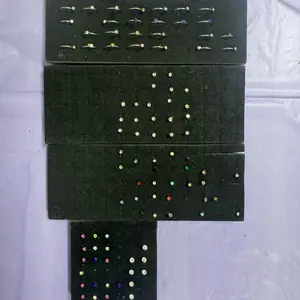 Nose Rings - Collection of Various Items Displayed on Black Cards