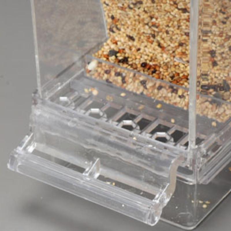 Automatic No Mess Bird Feeder – Transparent with perch. For small & medium birds (parakeet, cockatiel, lovebird, canary, finch). Easter Gift Automatic No Mess Bird Feeder – Transparent with perch. For small & medium birds (parakeet, cockatiel, lovebird, canary, finch). Easter Gift