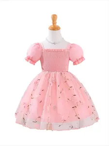 Toddler girl pink floral tulle dress features puff sleeves, smocked chest & soft mesh. Perfect for summer birthdays, photo shoots or parties. Cute, comfortable & trendy! #KidsFashion #ToddlerOOTD #SummerDress