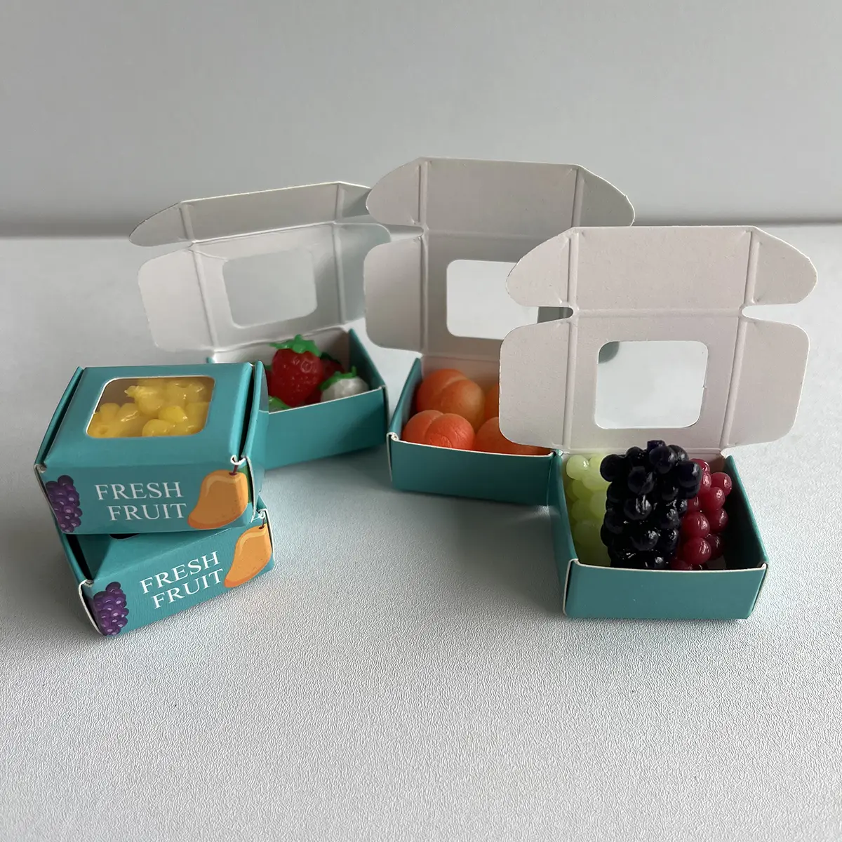 20 PCS Mini Squishy Fidget Toy Set with 4 Fruit Display Boxes, Tiny Pocket Squeeze Toys, Stress-Relief Desk Fidgets, Car Decor & Holiday Gifts,