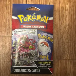 Pokémon Trading Card Game Pack - Contains 25 Cards with Foil Guaranteed Ultra Rares - Rayquaza VMAX & Rapid Rider - Collectible Trading Card