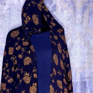 Abaya Clothing Size 54 - Dark Fabric with Floral Design and Drawstring Waistband