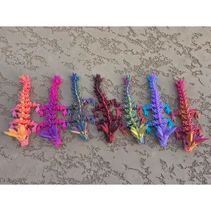 Enchanting Baby Dragon Figurine: Colorful Desk Companion for Fantasy Lovers