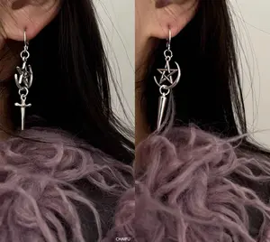 Whimsigoth Mismatched sailor moon earrings. Crescent dangle earrings. anime celestial earrings. spike dangle earrings