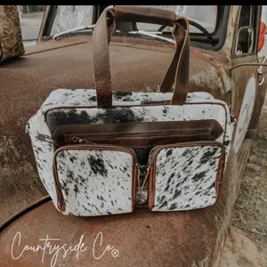 Saddleman Carry All Cowhide Duffle Bag by Countryside Co. with zipper closure and pockets